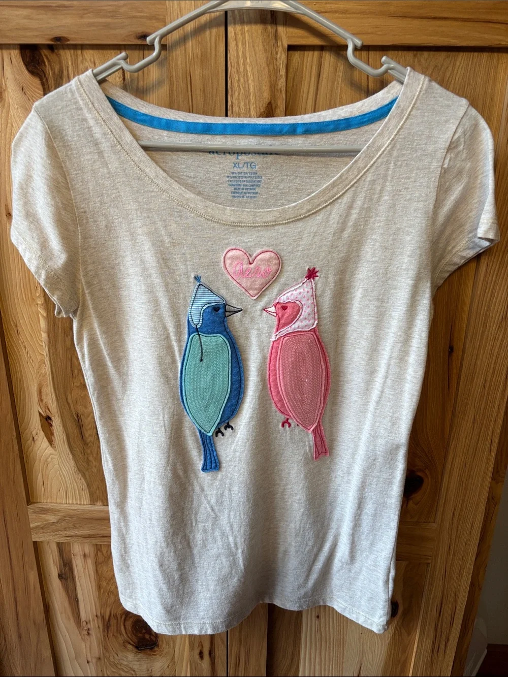 Aeropostale Beige Tee with Blue and Pink Bird Appliqués